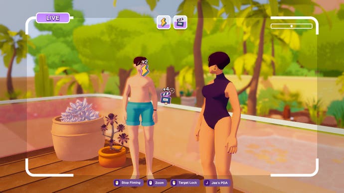 Two cast members are chatting in the garden in a screenshot of The Crush House.